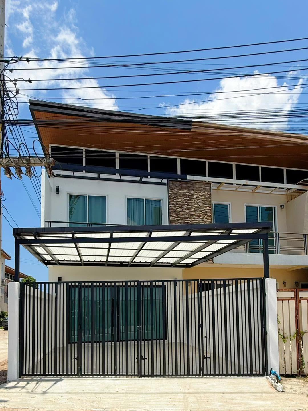Two-Storey Corner House · Roadside